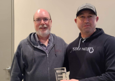 Brian Durham and Darrell Breshears pose for a photo.